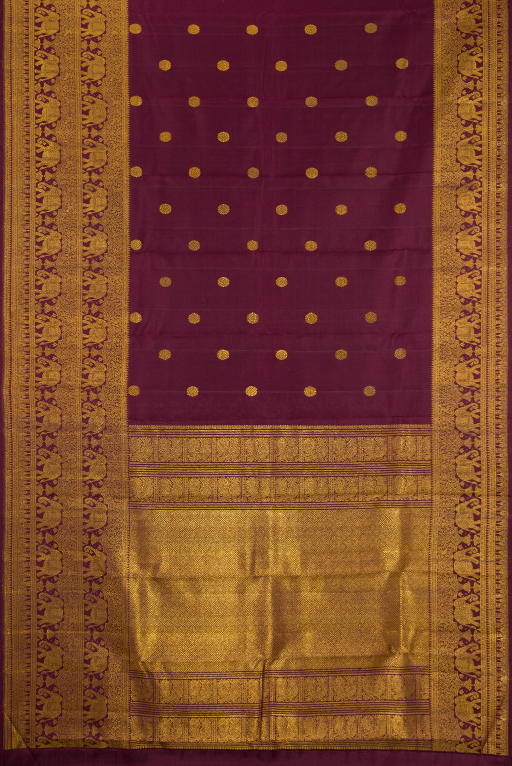 Flat view of Coffee Brown Kanchipuram Silk Saree with Zari Butta on the body and Fancy Border. 