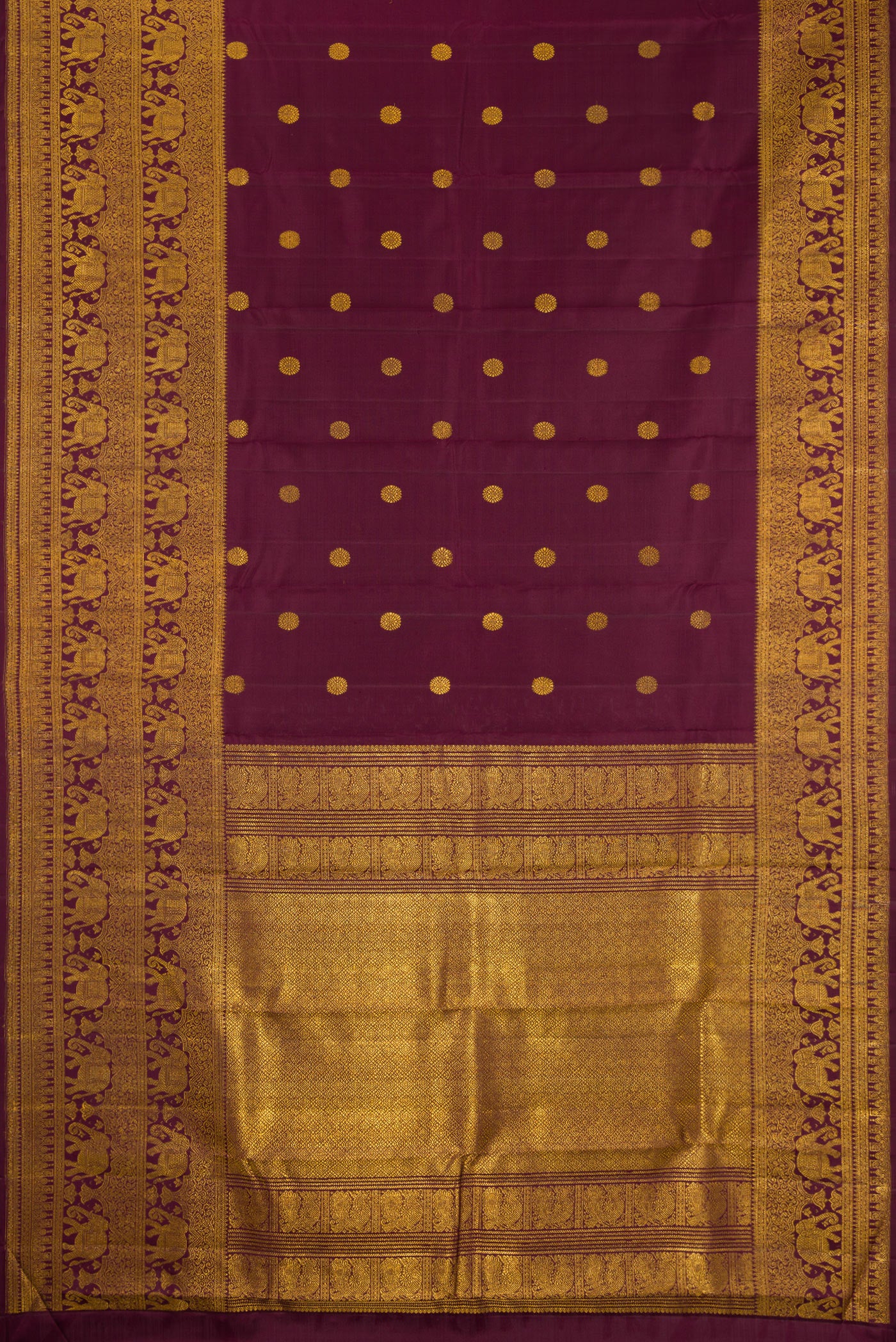 Flat view of Coffee Brown Kanchipuram Silk Saree with Zari Butta on the body and Fancy Border. 