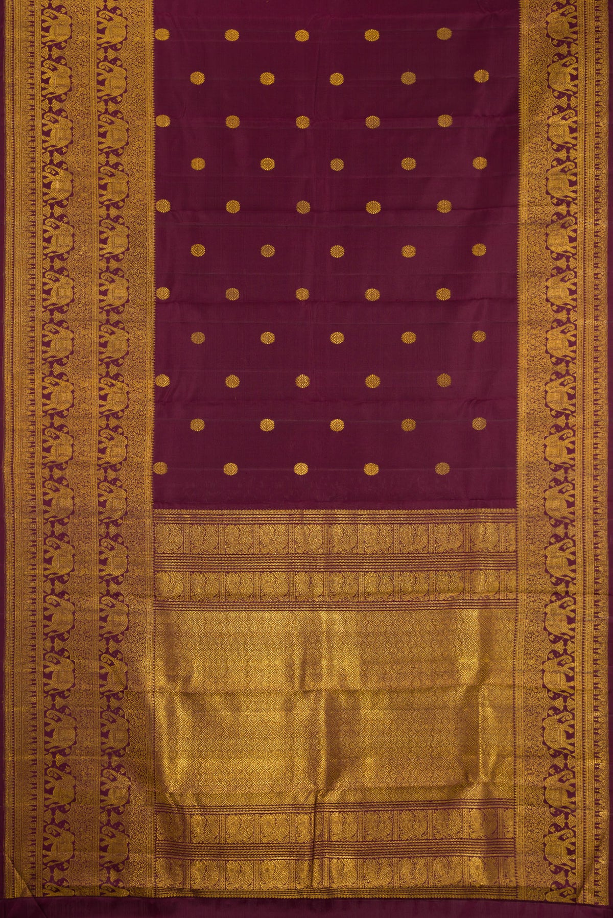 Flat view of Coffee Brown Kanchipuram Silk Saree with Zari Butta on the body and Fancy Border. 