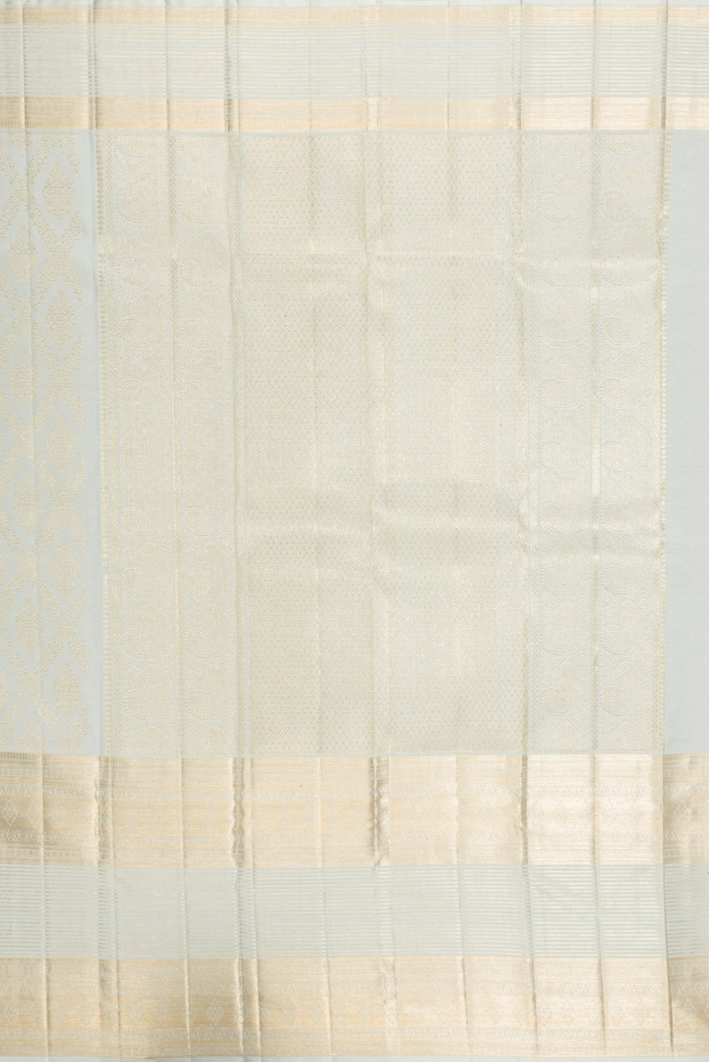 Close up image of the pallu of Light Blue Kanchipuram Silk Saree with Zari Brocade on the body and Fancy Border. 