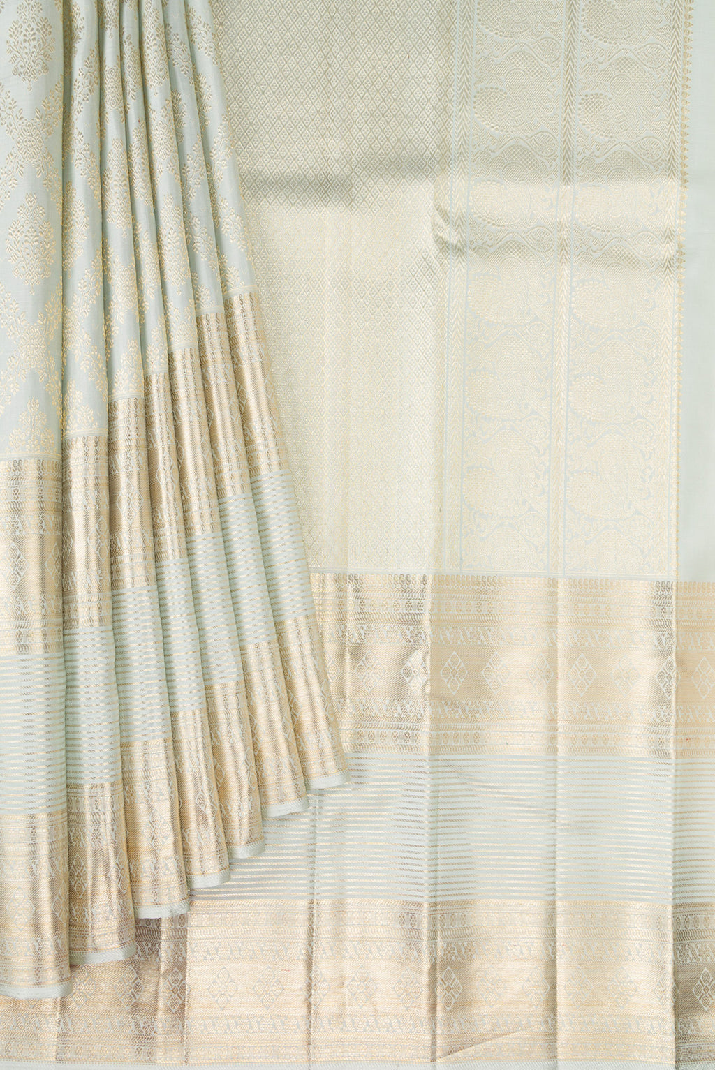 Pleats and pallu of Light Blue Kanchipuram Silk Saree with Zari Brocade on the body and Fancy Border. 
