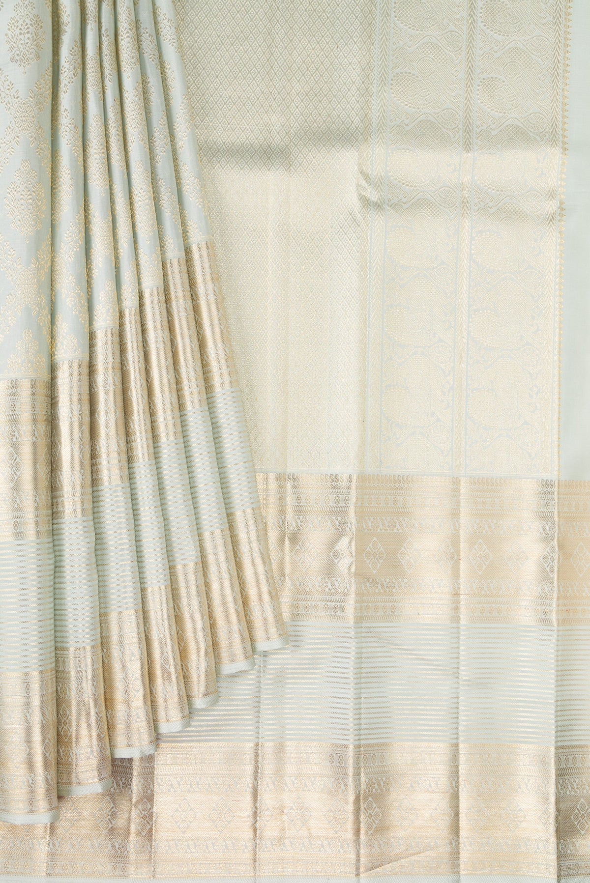 Pleats and pallu of Light Blue Kanchipuram Silk Saree with Zari Brocade on the body and Fancy Border. 