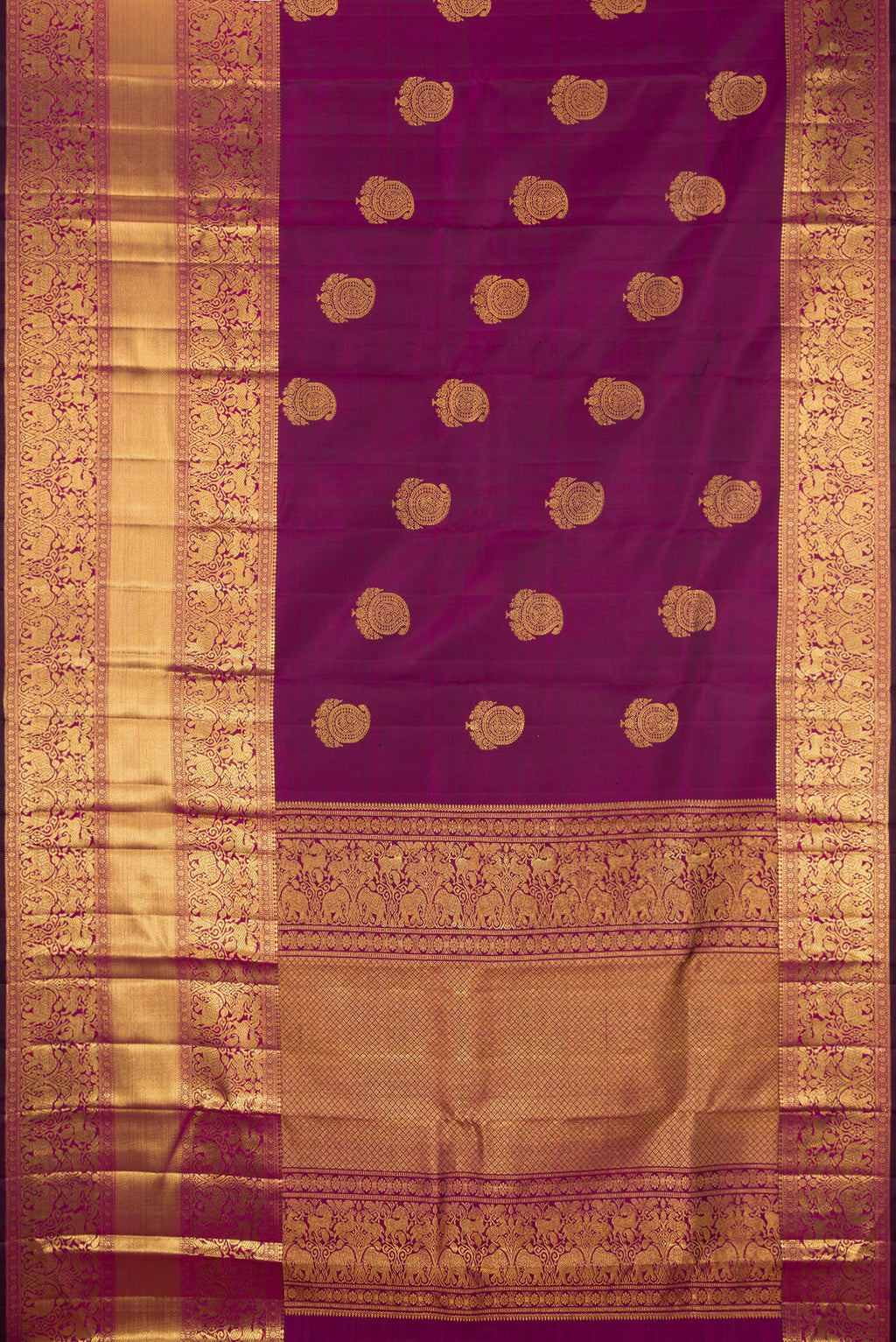 Flat view of Magenta Dual Tone Kanchipuram Silk Saree with Zari Butta on the body and Fancy Border. 