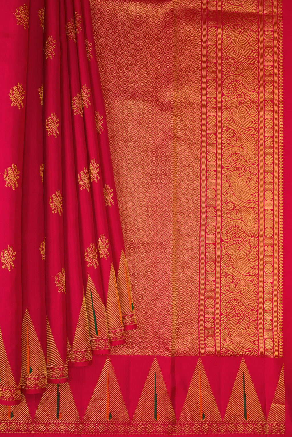 Pleats and pallu of Maroon Kanchipuram Silk Saree with Zari Butta on the body and Paithani Border. 