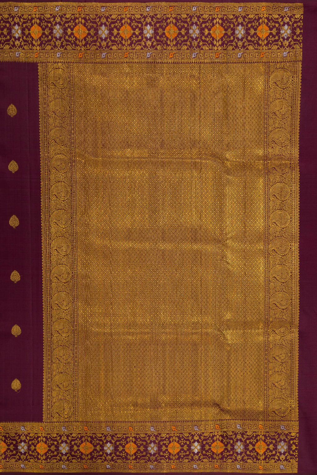 Close up image of the pallu of Coffee Brown Kanchipuram Silk Saree with Zari Butta on the body and Fancy Border. 