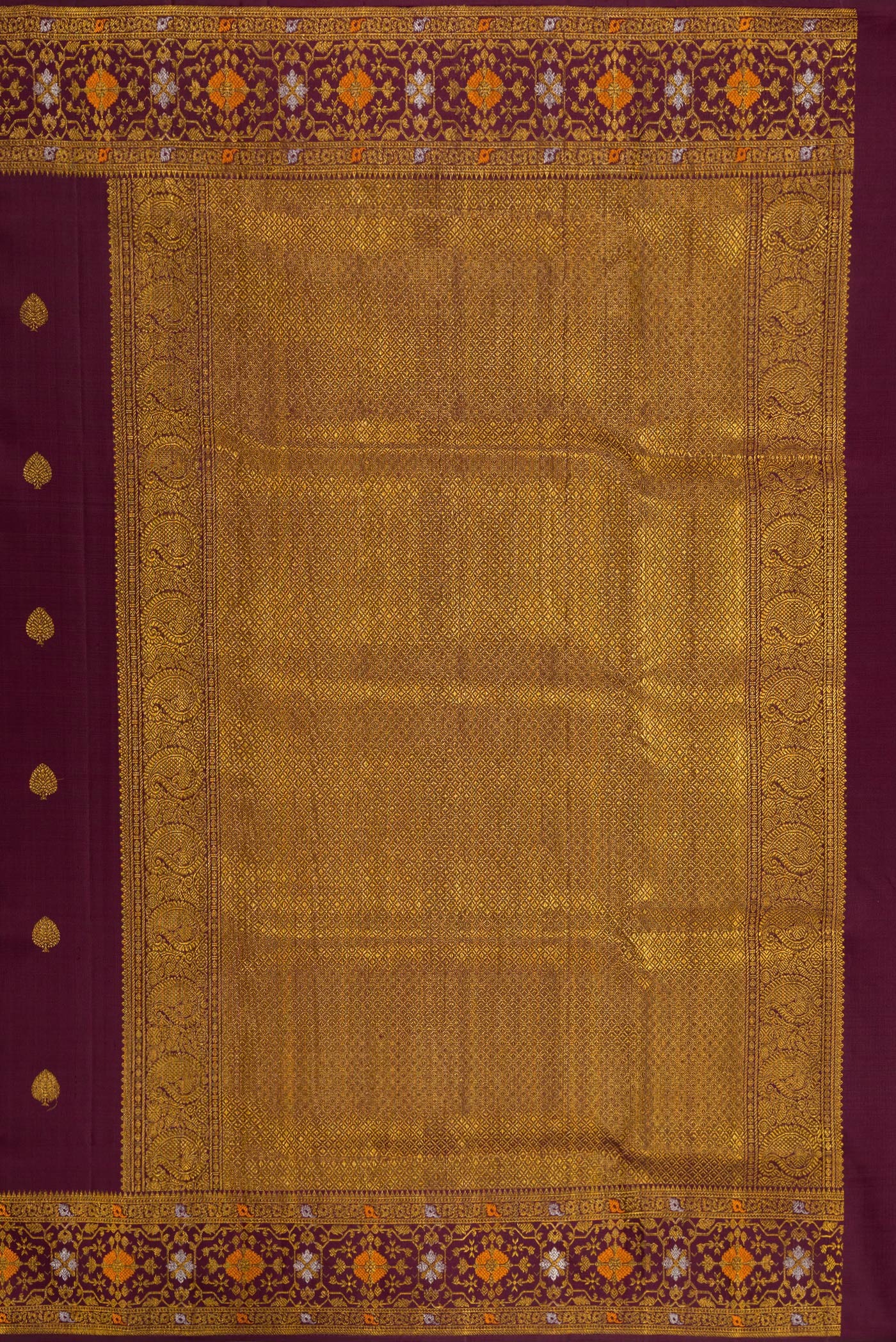 Close up image of the pallu of Coffee Brown Kanchipuram Silk Saree with Zari Butta on the body and Fancy Border. 