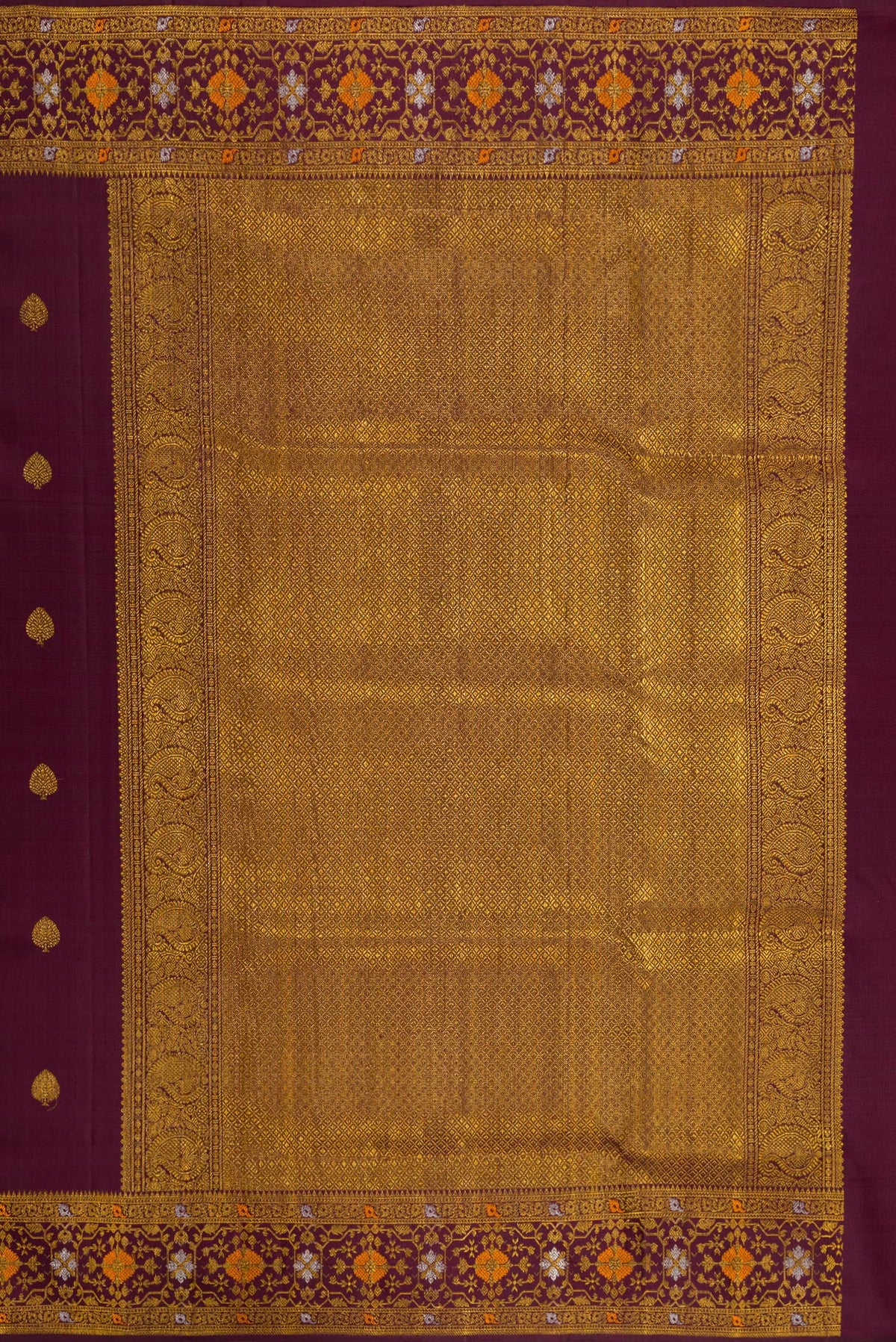Close up image of the pallu of Coffee Brown Kanchipuram Silk Saree with Zari Butta on the body and Fancy Border. 