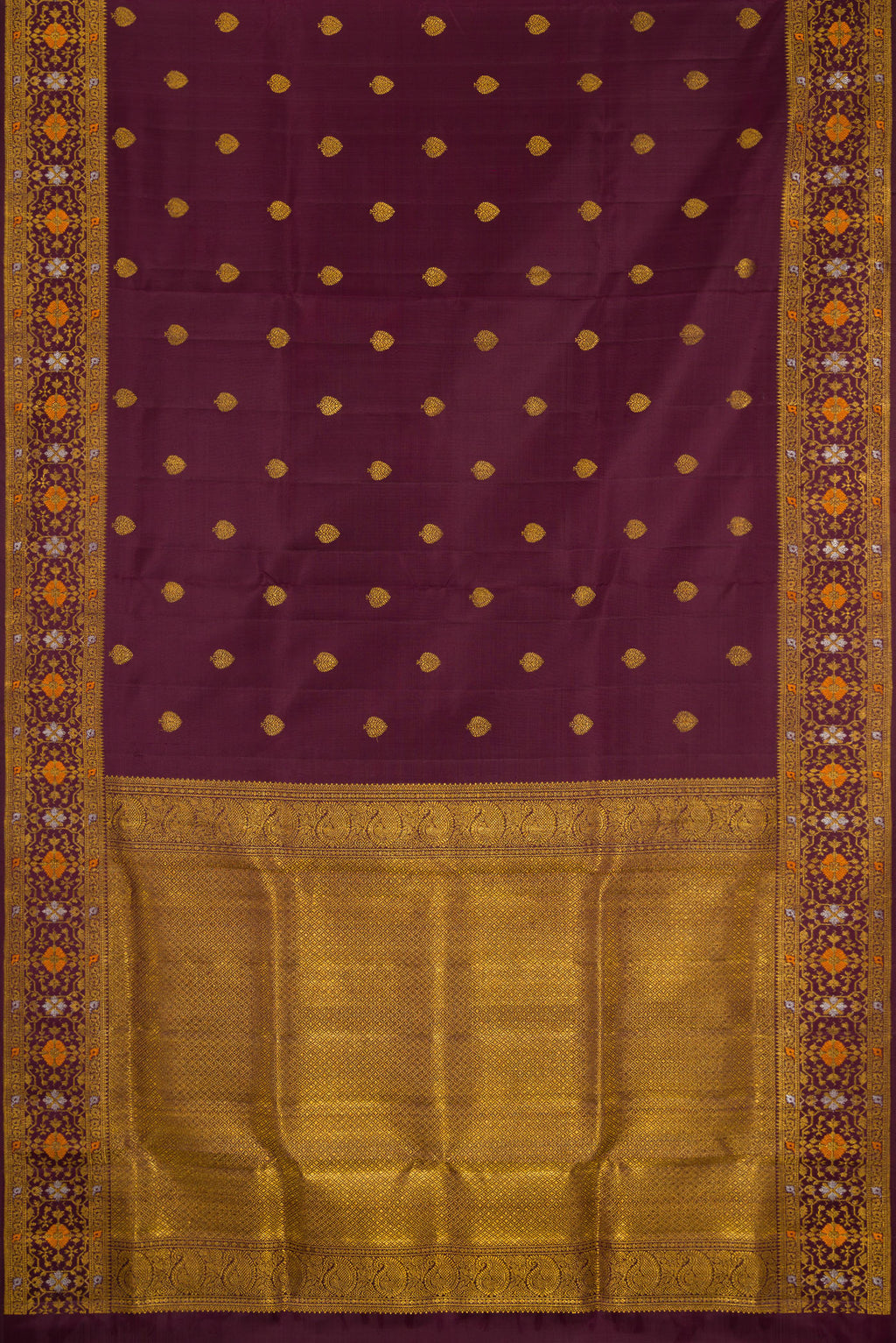 Flat view of Coffee Brown Kanchipuram Silk Saree with Zari Butta on the body and Fancy Border. 
