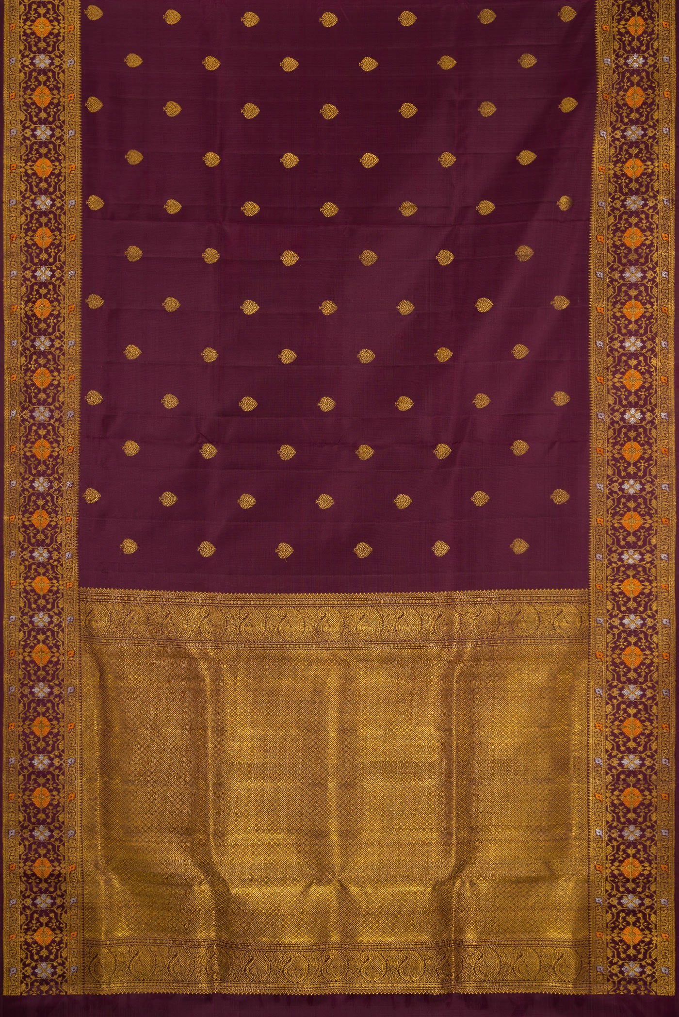 Flat view of Coffee Brown Kanchipuram Silk Saree with Zari Butta on the body and Fancy Border. 