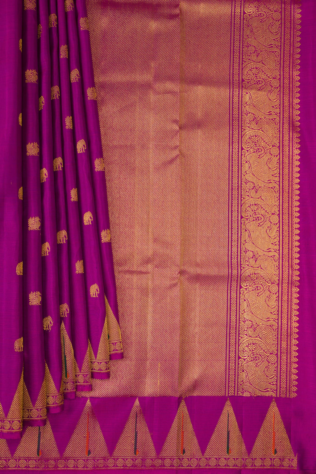 Pleats and pallu of Magenta Kanchipuram Silk Saree with Zari Butta on the body and Paithani Border. 