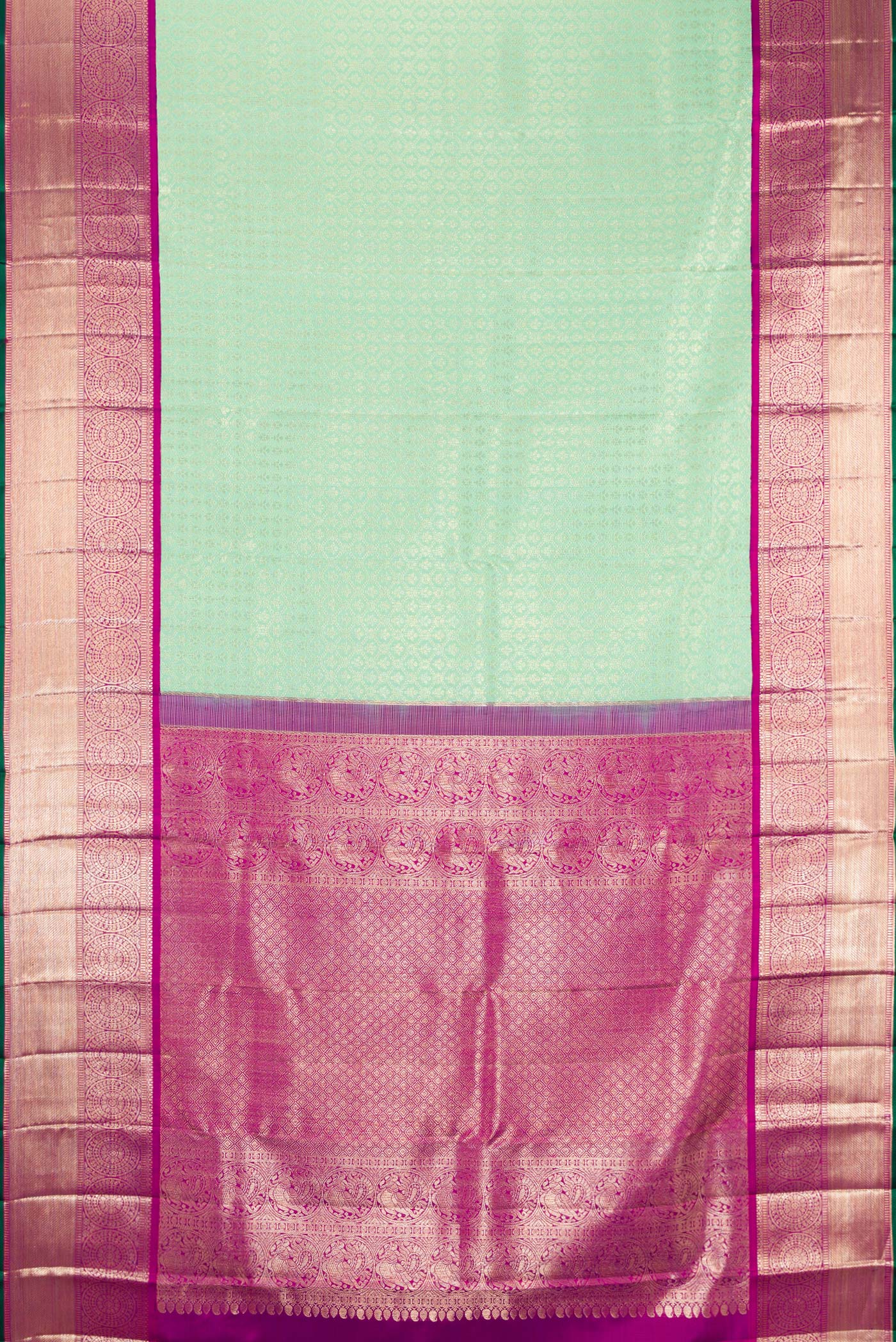 Flat view of Pista Green Kanchipuram Silk Saree with Zari Brocade on the body and Zari Border. 