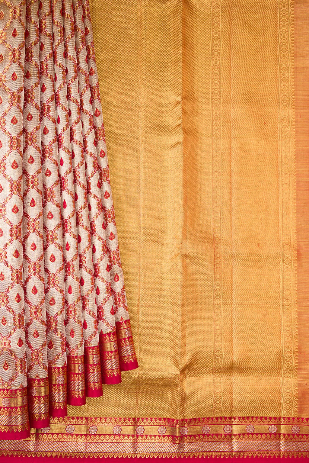 Pleats and pallu of Gold Dual Tone Kanjivaram Tissue Saree with Zari Brocade on the body and Fancy Border. 