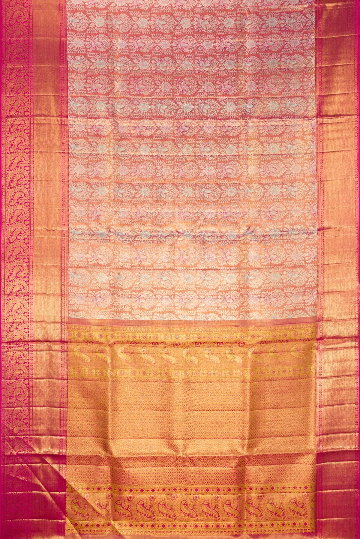 Flat view of Gold Dual Tone Kanjivaram Tissue Saree with Zari Brocade on the body and Zari Border. 