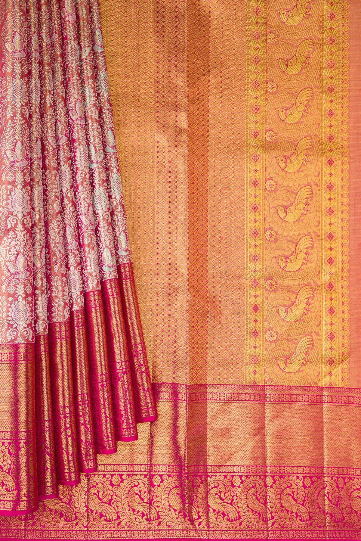 Pleats and pallu of Gold Dual Tone Kanjivaram Tissue Saree with Zari Brocade on the body and Zari Border. 