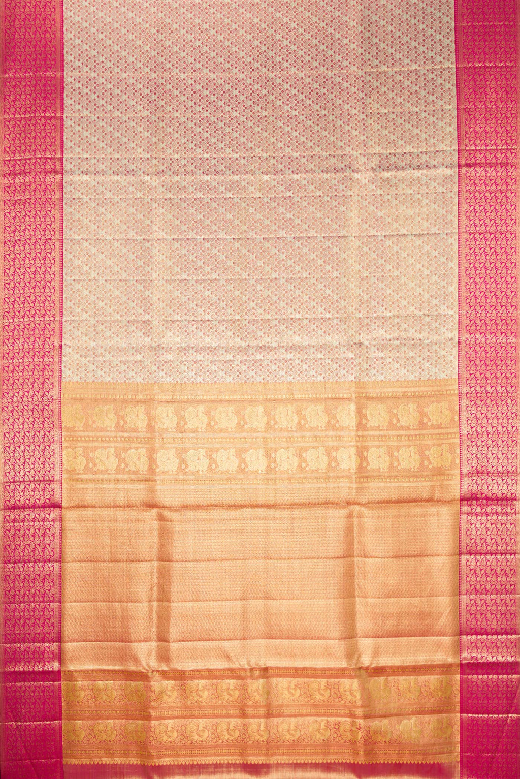 Flat view of Gold Dual Tone Kanjivaram Tissue Saree with Zari Brocade on the body and Fancy Border. 