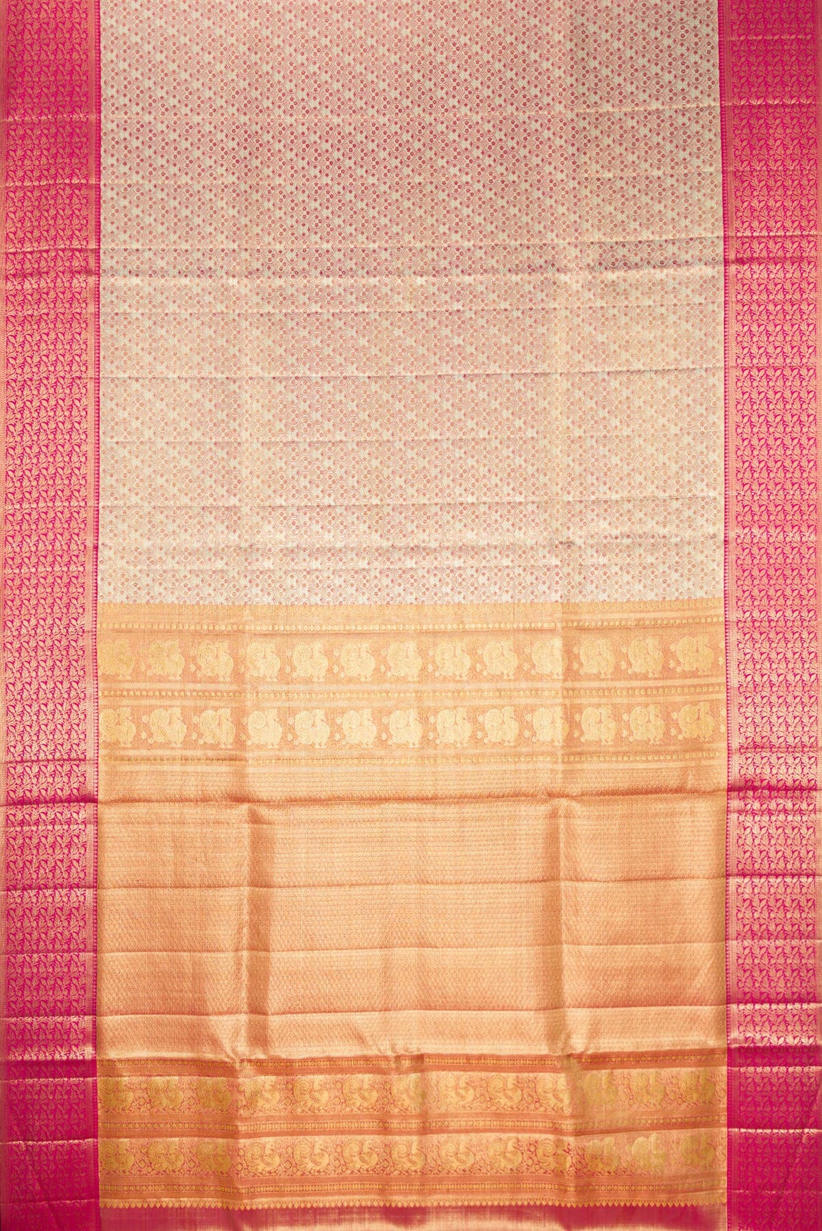 Flat view of Gold Dual Tone Kanjivaram Tissue Saree with Zari Brocade on the body and Fancy Border. 