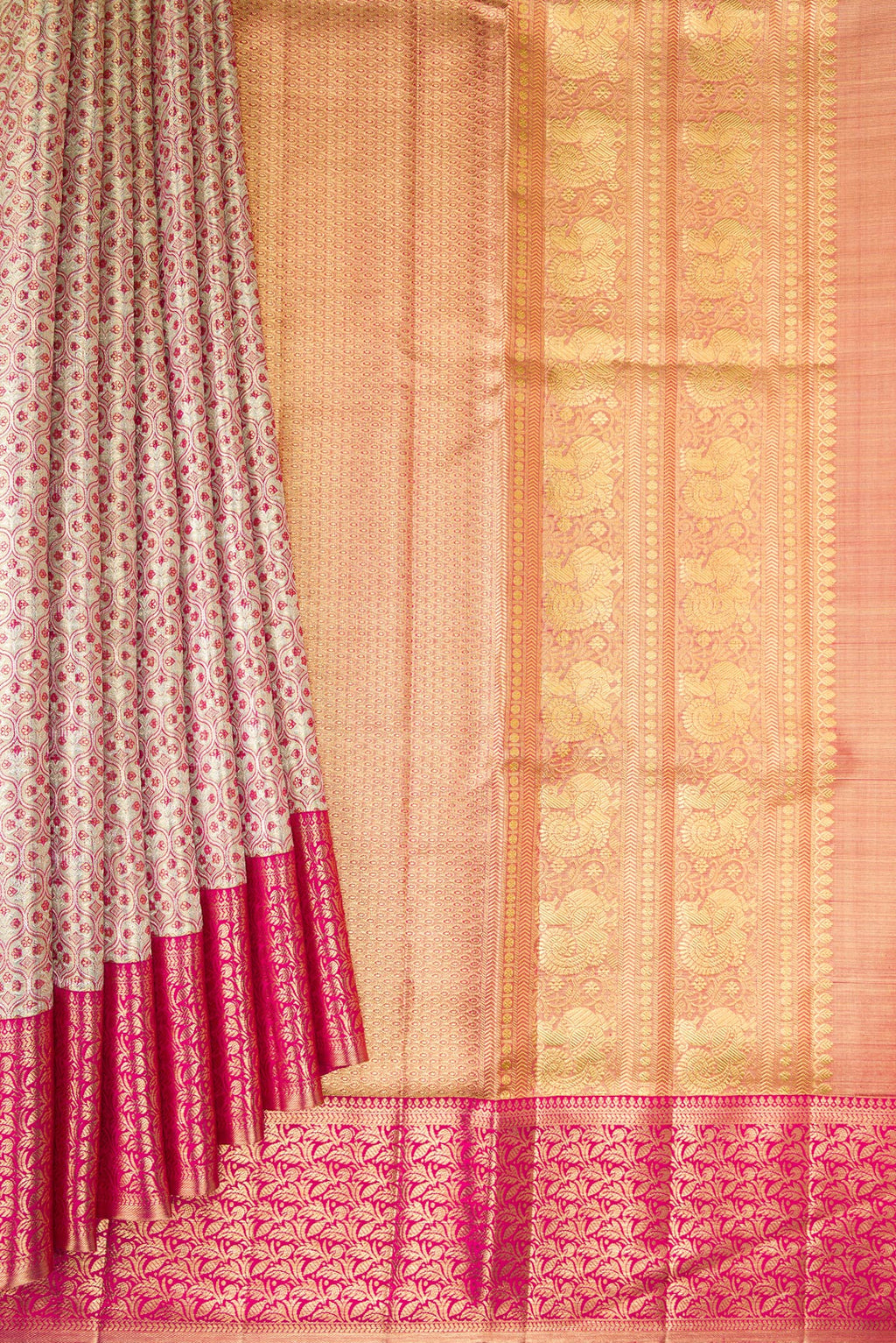 Pleats and pallu of Gold Dual Tone Kanjivaram Tissue Saree with Zari Brocade on the body and Fancy Border. 
