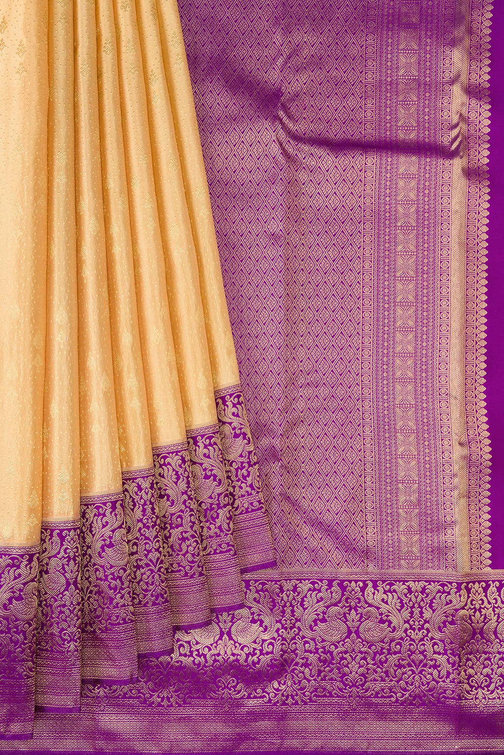 Pleats and pallu of Sandal Kanchipuram Silk Saree with Zari Brocade on the body and Fancy Border. 