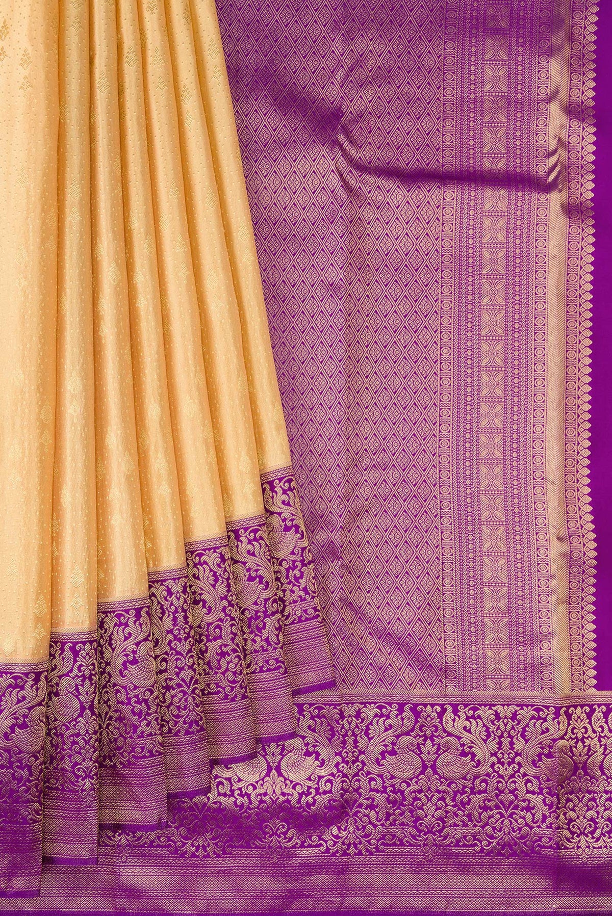Pleats and pallu of Sandal Kanchipuram Silk Saree with Zari Brocade on the body and Fancy Border. 