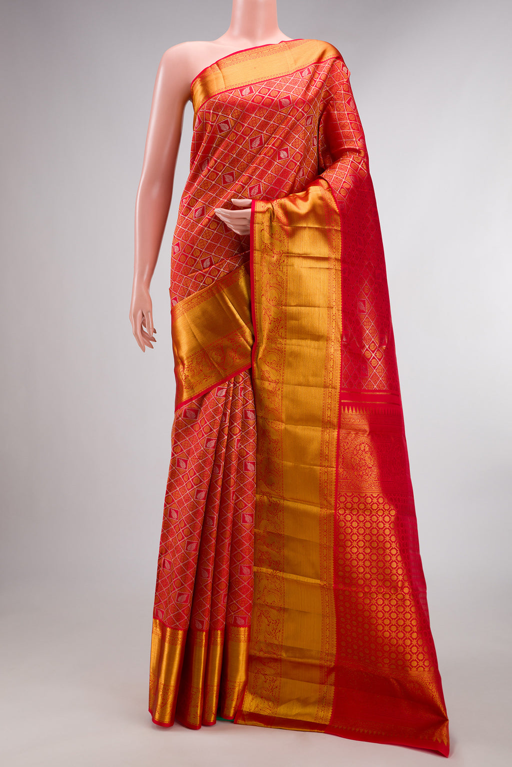 Pure Silk Red Dual Tone Kanjivaram Saree with Zari Brocade on the body and Zari Border.  displayed on a mannequin
