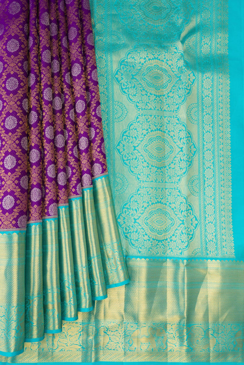 Pleats and pallu of Pure Silk Purple Kanjivaram Saree with Zari Brocade on the body and Zari Border. 