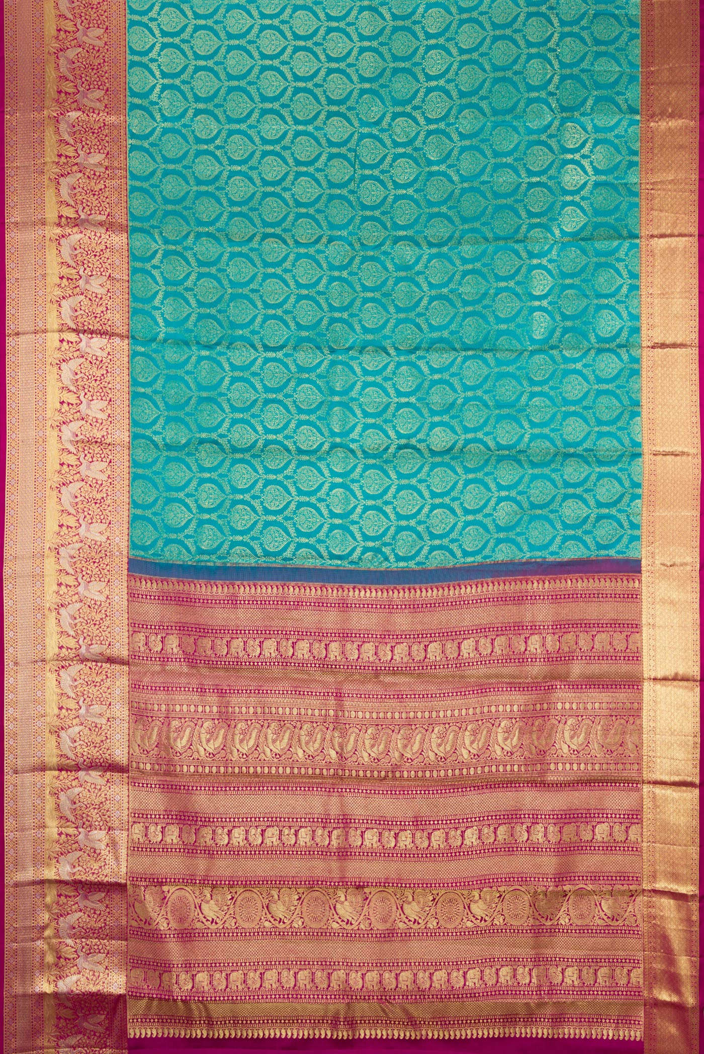 Flat view of Green Dual Tone Kanjivaram Silk Saree with Zari Brocade on the body and Zari Border. 