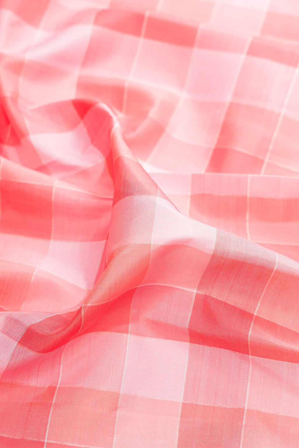 Close up of Pure Silk Pure Zari Multi Color Kanchipuram Saree with Checked design on the body and Zari Border.  displaying folds