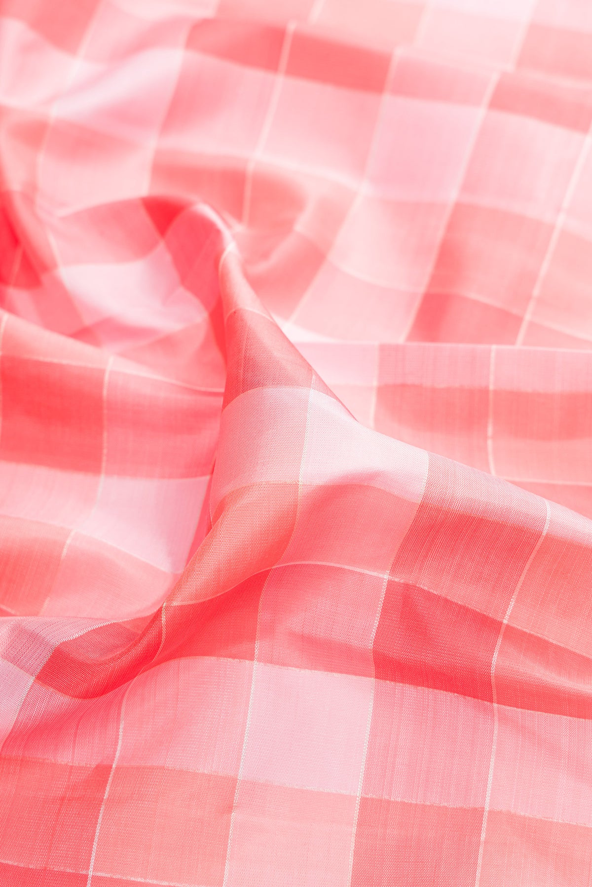 Close up of Pure Silk Pure Zari Multi Color Kanchipuram Saree with Checked design on the body and Zari Border.  displaying folds