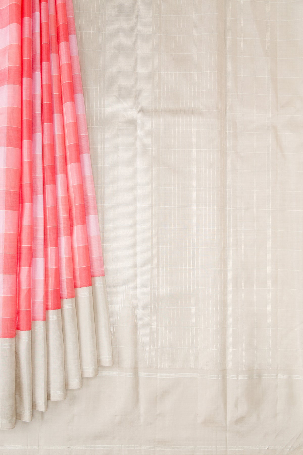 Pleats and pallu of Pure Silk Pure Zari Multi Color Kanchipuram Saree with Checked design on the body and Zari Border. 