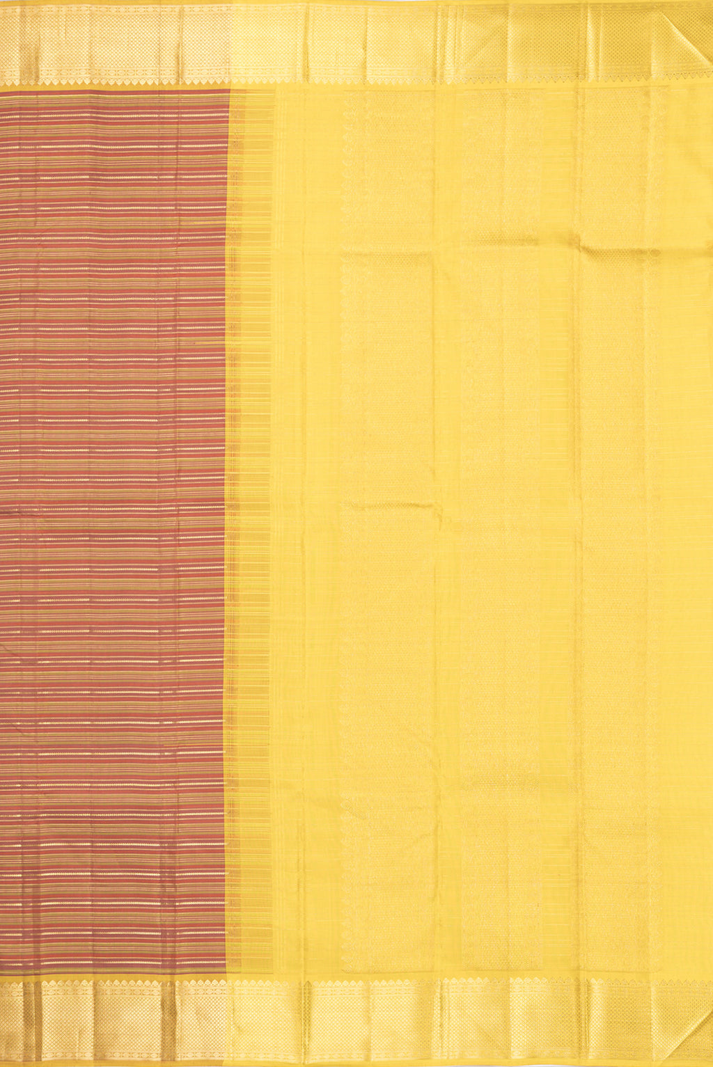 Close up image of the pallu of Pure Silk Rust and Green Color Kanchipuram Saree with Stripes on the body and Zari Border. 