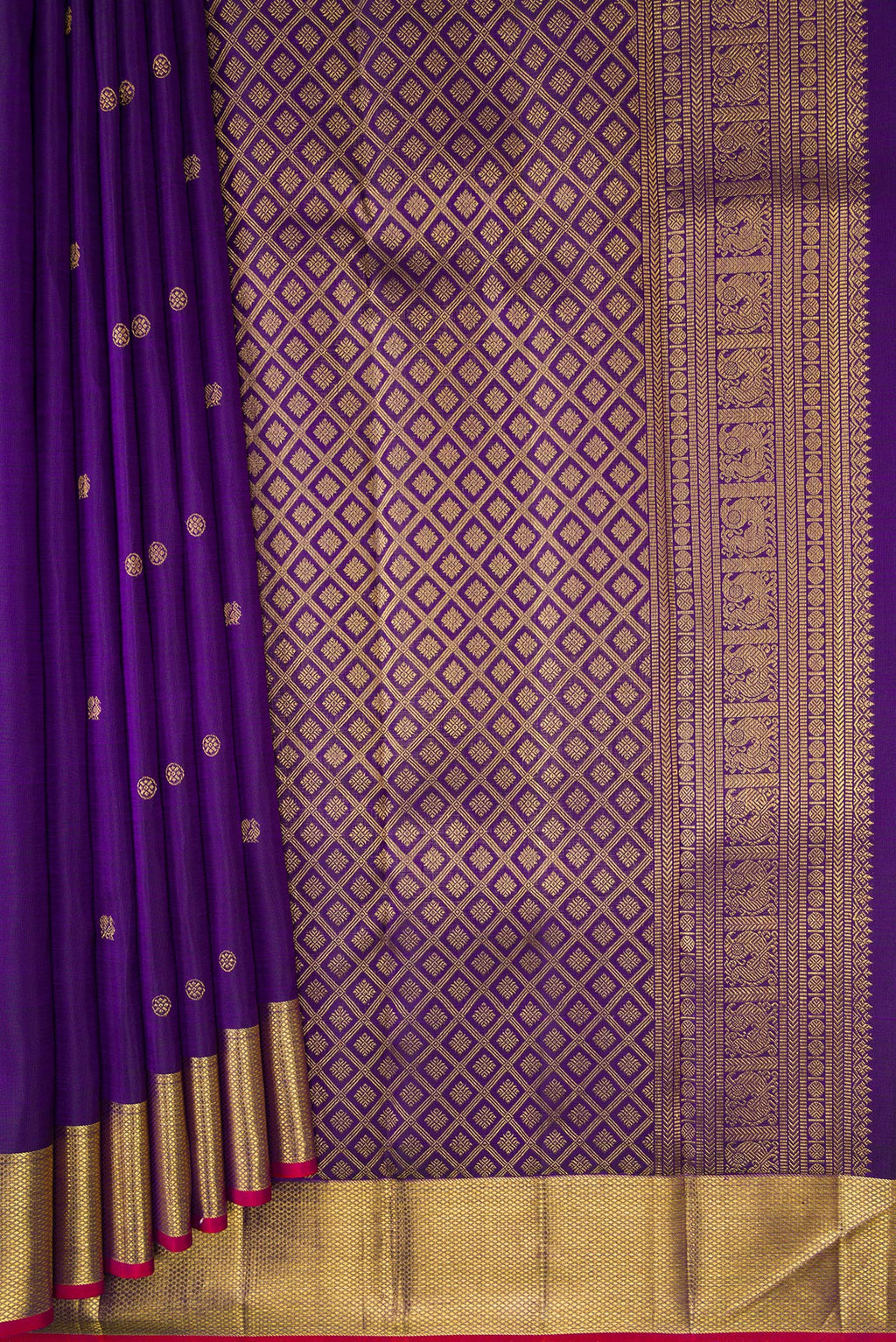 Pleats and pallu of Pure Silk Violet Kanjivaram Saree with Zari Butta on the body and Zari Border. 