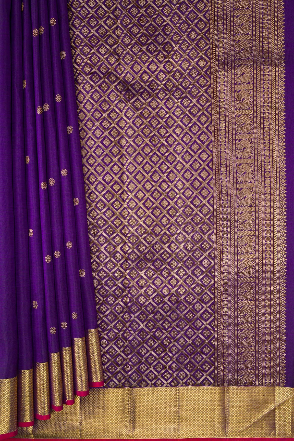 Pleats and pallu of Pure Silk Violet Kanjivaram Saree with Zari Butta on the body and Zari Border. 