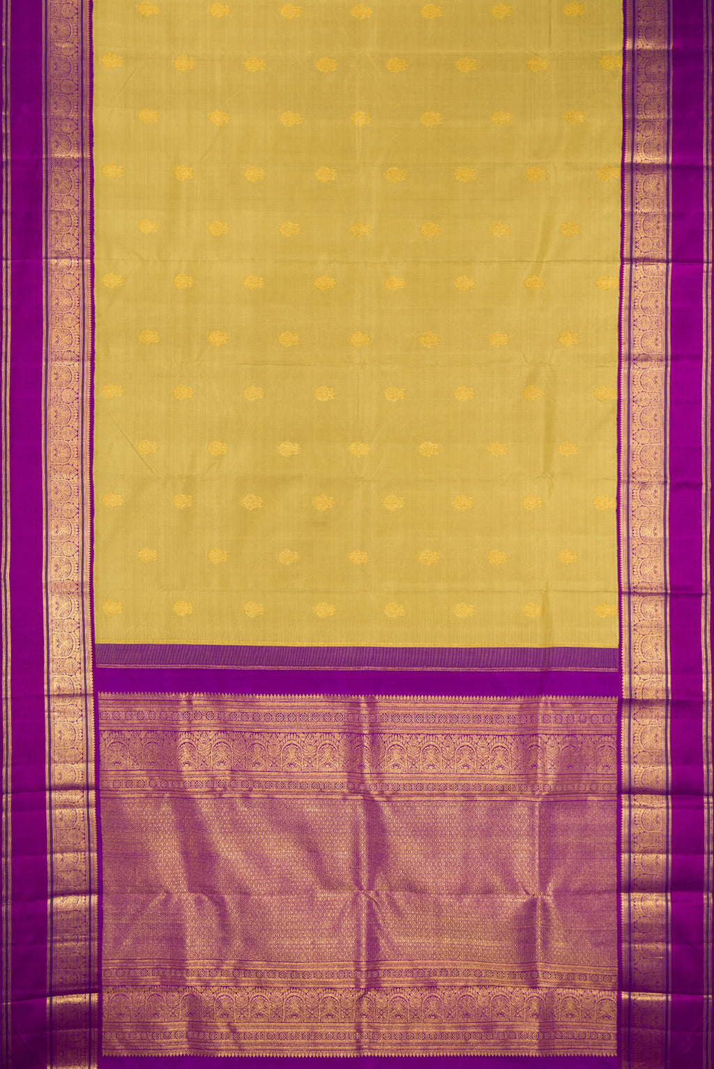 Flat view of Pure Silk Gold Kanchipuram Saree with Zari Butta on the body and Zari Border. 