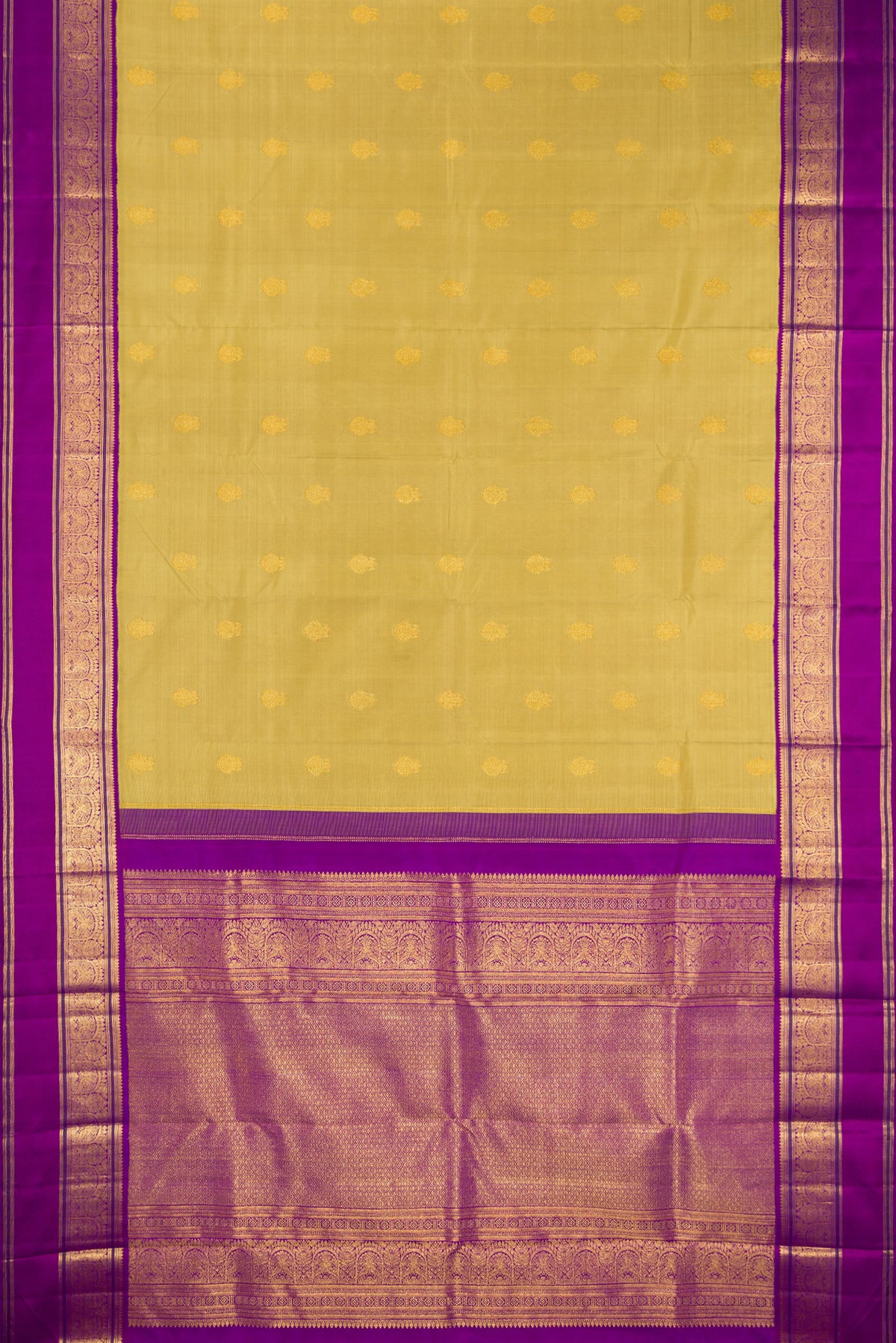 Flat view of Pure Silk Gold Kanchipuram Saree with Zari Butta on the body and Zari Border. 