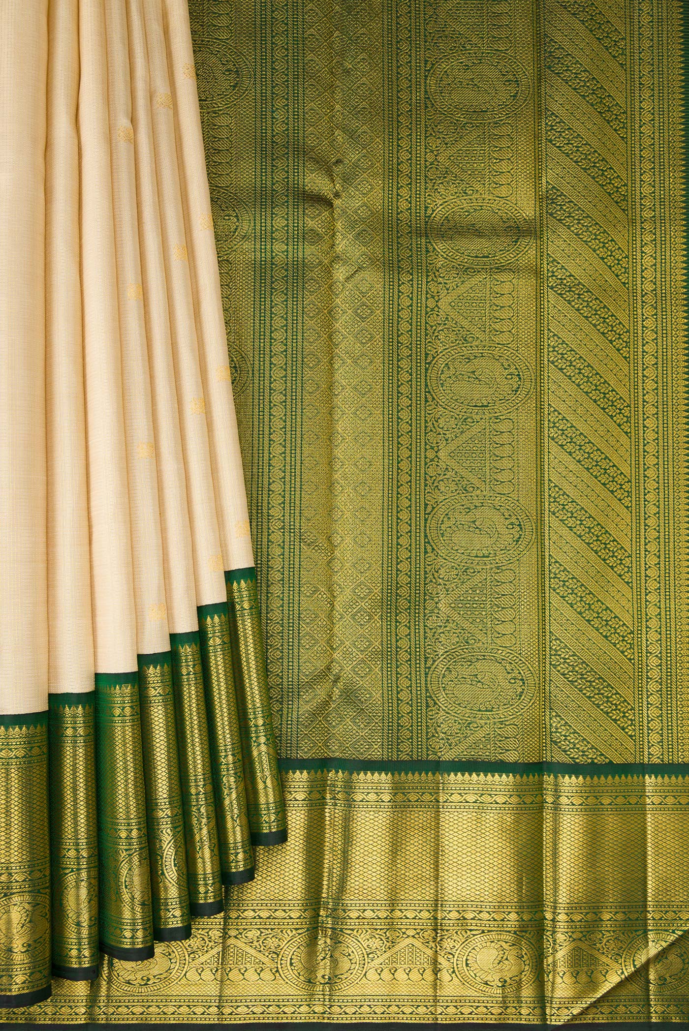Pleats and pallu of Sandal Kanchipuram Silk Saree with Checked design on the body and Zari Border. 
