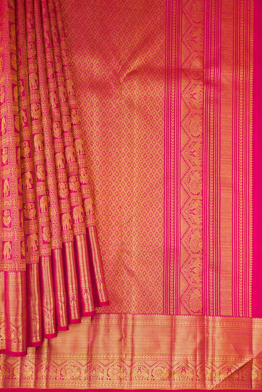 Pleats and pallu of Rani Pink Kanchipuram Silk Saree with Zari Brocade on the body and Zari Border. 