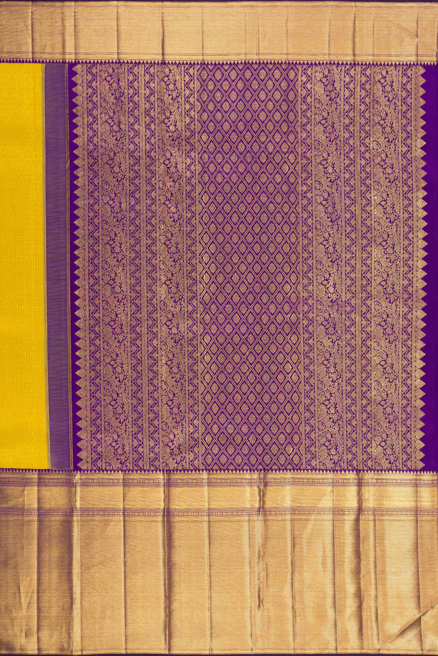 Close up image of the pallu of Yellow Kanchipuram Silk Saree with Zari Butta on the body and Fancy Border. 