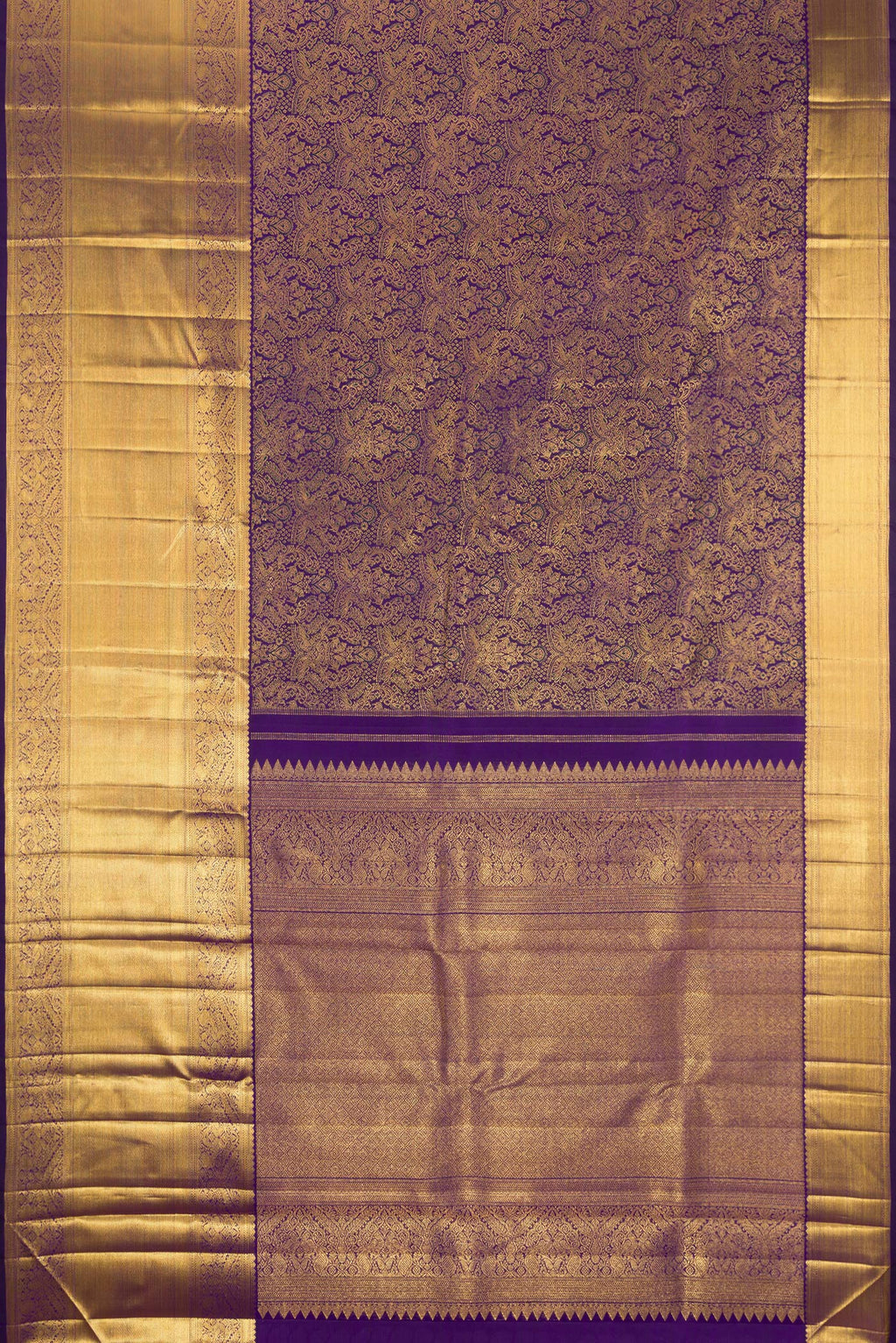 Flat view of Navy Blue Dual Tone Kanchipuram Silk Saree with Zari Brocade on the body and Fancy Border. 