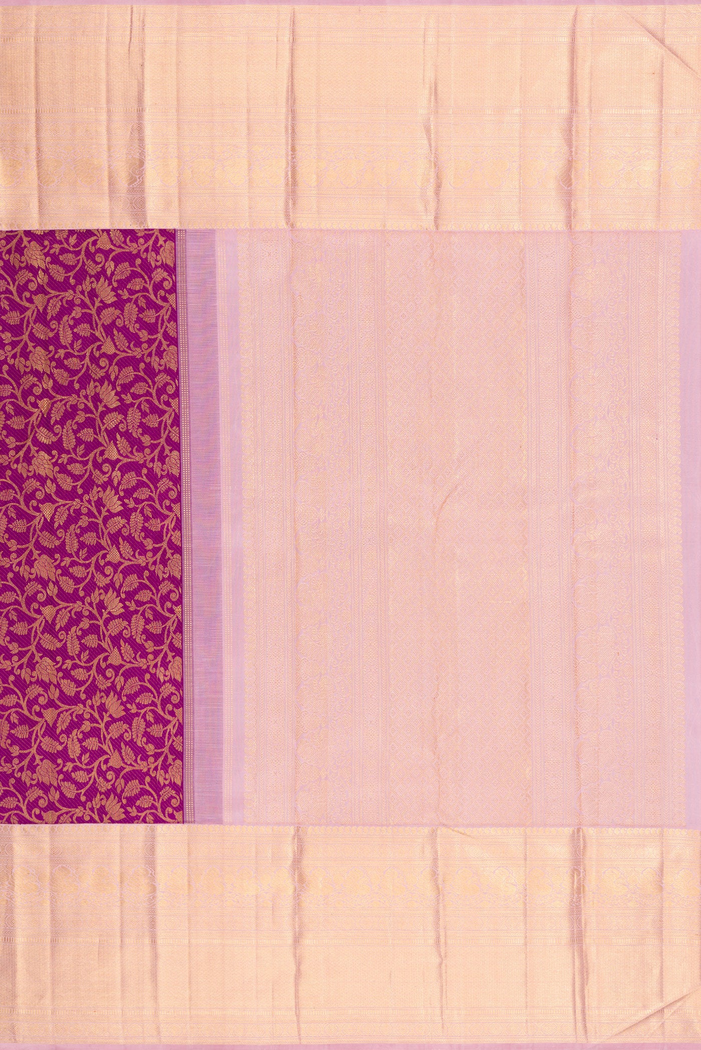 Close up image of the pallu of Purple Kanchipuram Silk Saree with Zari Brocade on the body and Zari Border. 