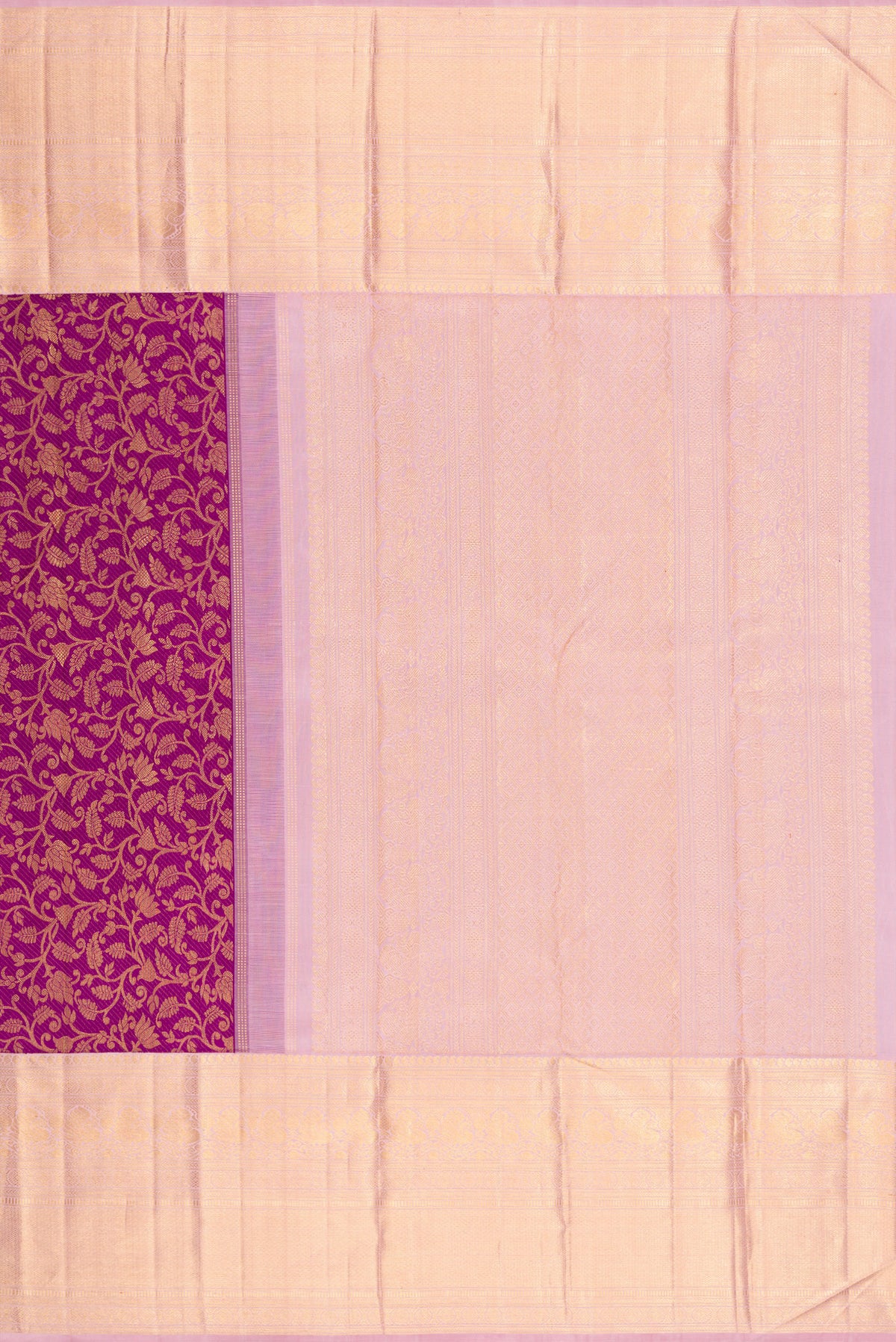 Close up image of the pallu of Purple Kanchipuram Silk Saree with Zari Brocade on the body and Zari Border. 
