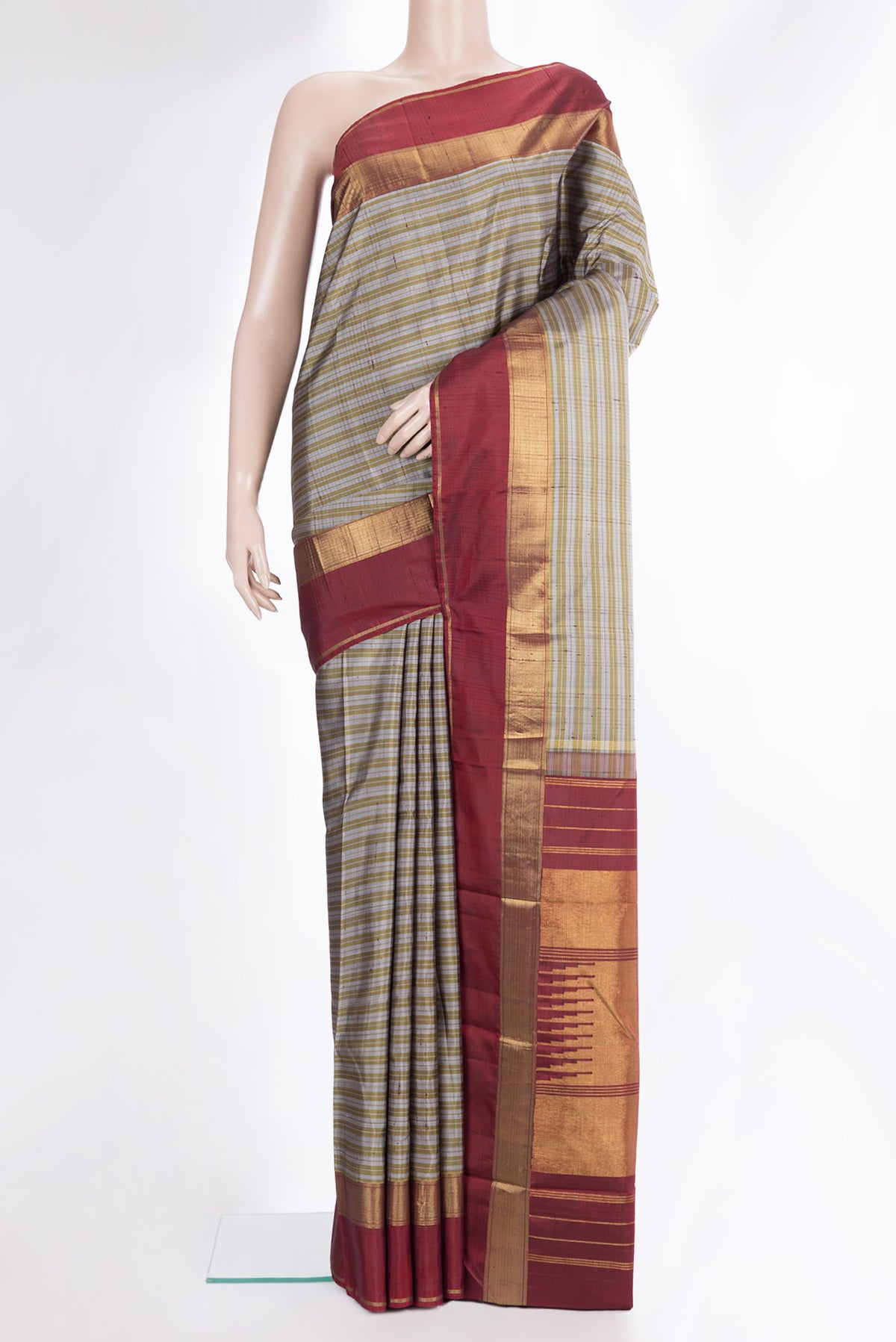 Pure Silk Grey Dual Tone Kanchipuram Saree with Checked design on the body and Zari Border.  displayed on a mannequin