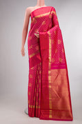 Pure Silk Pink Kanjivaram Saree with Jacquard With Zari Butta on the body and Zari Border.  displayed on a mannequin