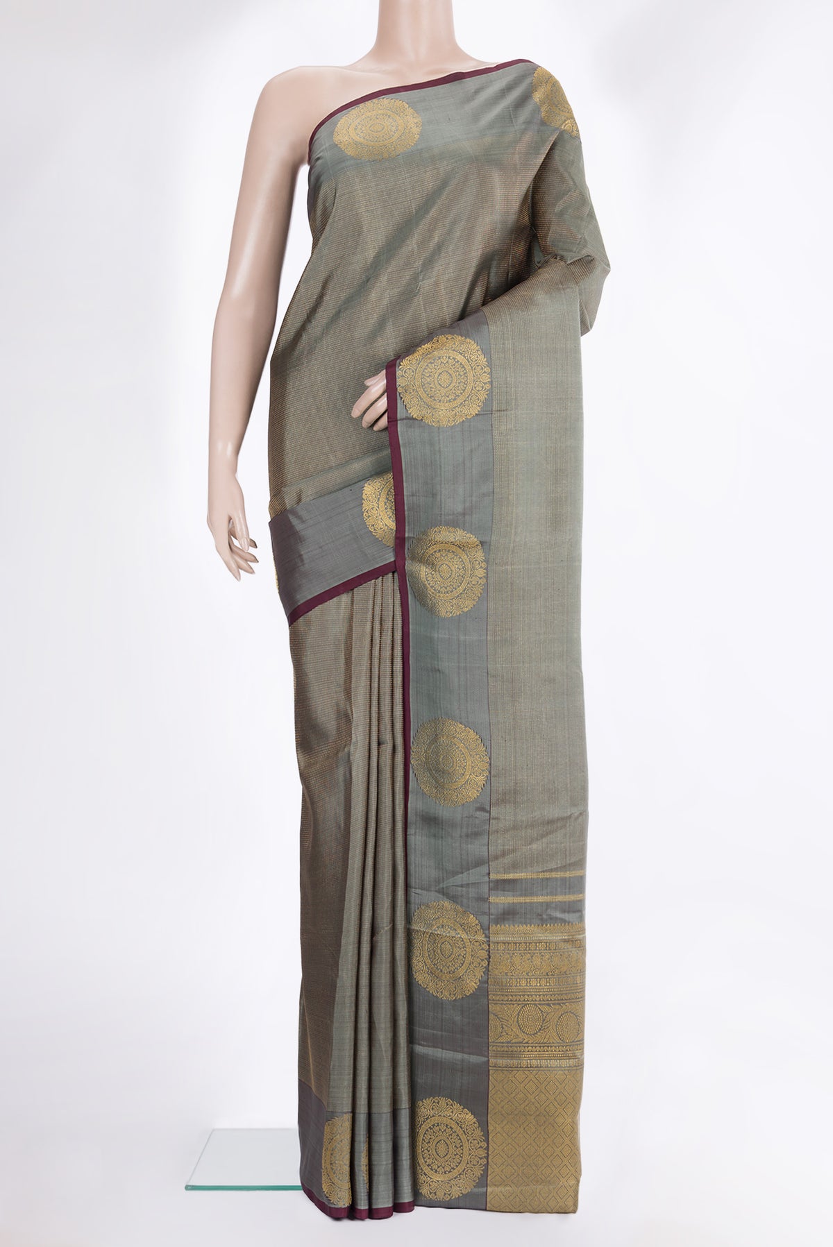 Pure Silk Grey Kanjivaram Saree with Stripes on the body and Fancy Border.  displayed on a mannequin