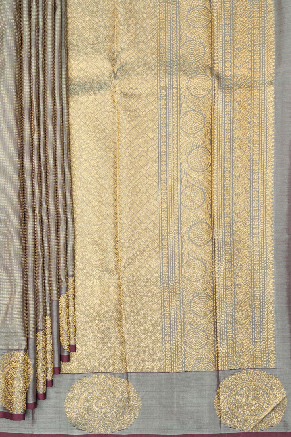Pleats and pallu of Pure Silk Grey Kanjivaram Saree with Stripes on the body and Fancy Border. 