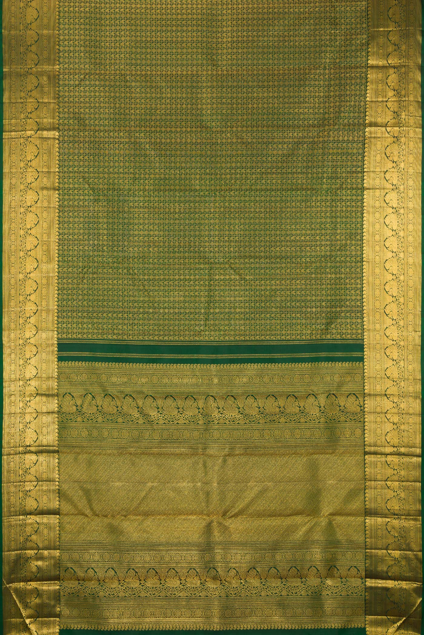 Flat view of Bottle Green Kanchipuram Silk Saree with Zari Brocade on the body and Zari Border. 
