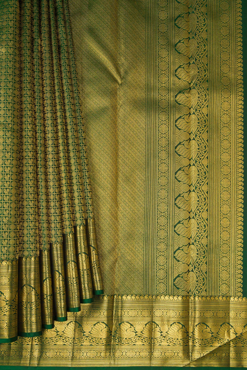 Pleats and pallu of Bottle Green Kanchipuram Silk Saree with Zari Brocade on the body and Zari Border. 
