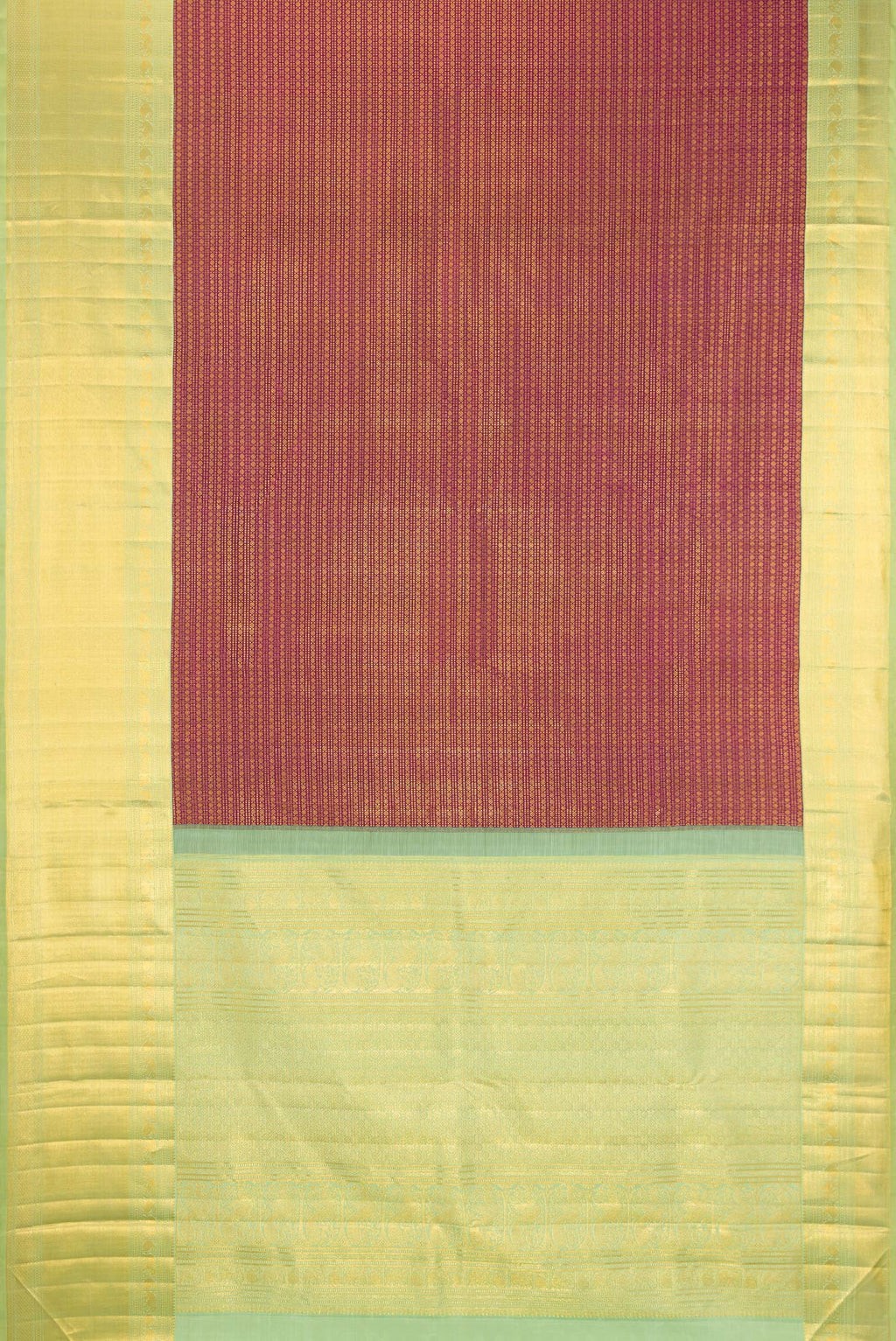 Flat view of Magenta Kanchipuram Silk Saree with Zari Brocade on the body and Zari Border. 