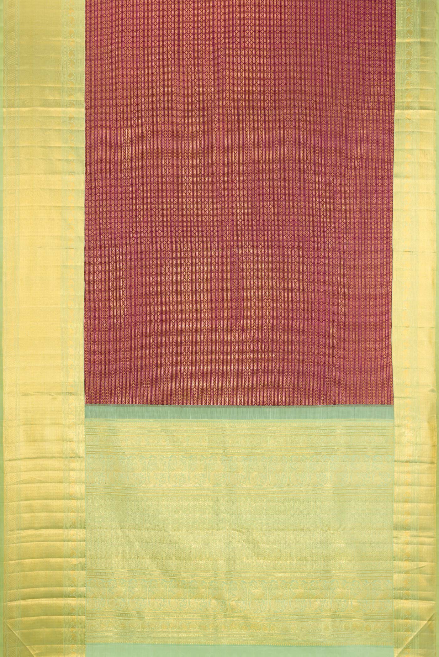 Flat view of Magenta Kanchipuram Silk Saree with Zari Brocade on the body and Zari Border. 
