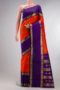 Pure Silk Pure Zari Brick Orange Dual Tone Kanchipuram Saree with Zari Butta on the body and Zari Border.  displayed on a mannequin