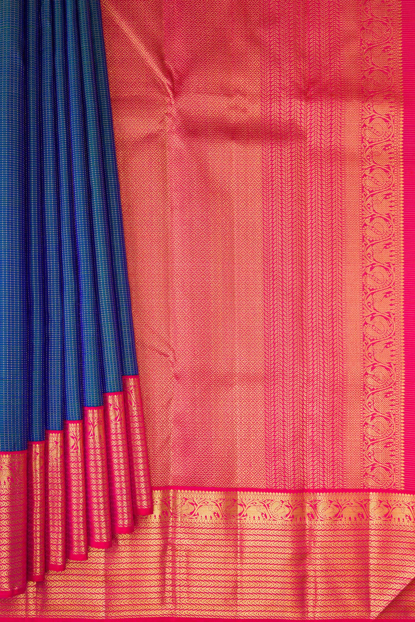 Pleats and pallu of Peacock Blue Dual Tone Kanchipuram Silk Saree with Checked design on the body and Zari Border. 